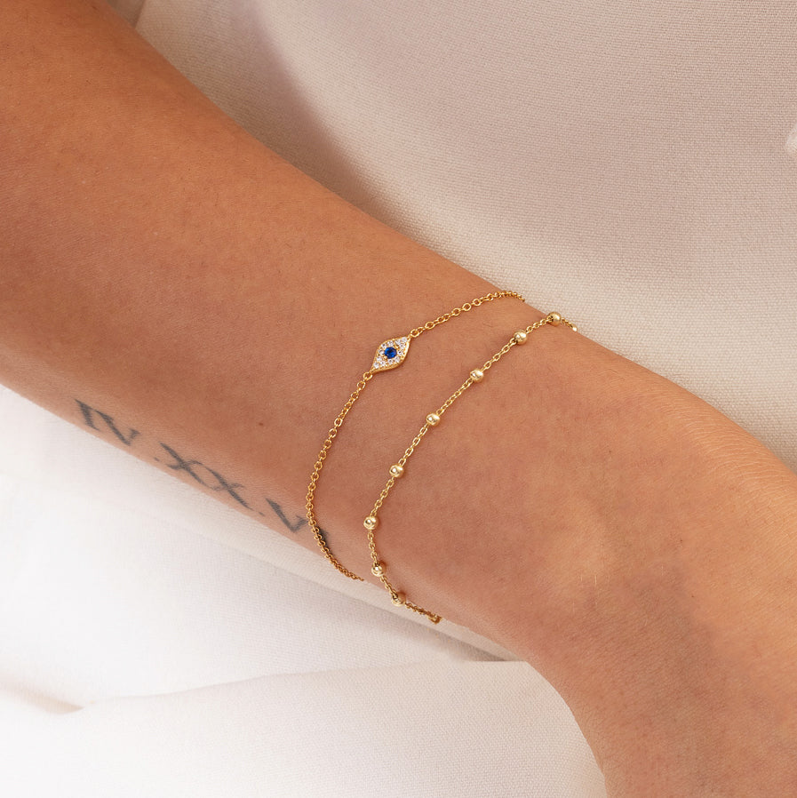 Gold bead enamel evil eye bracelet blue